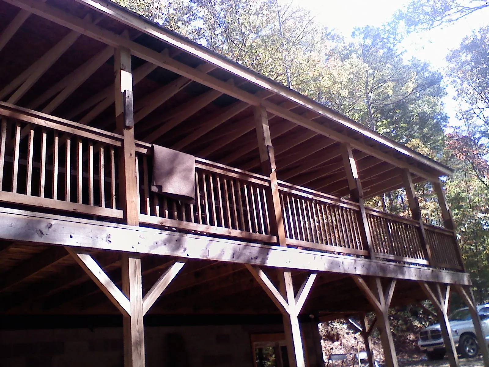 Timber framing under a new elevated porch and deck — Roof Leak Repair in Troutman by Roofing Brothers